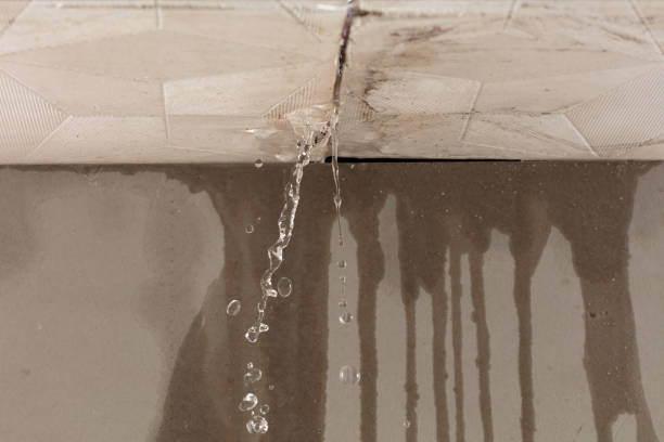 Professional Flood Damage Cleanup technician working in Milford, NH